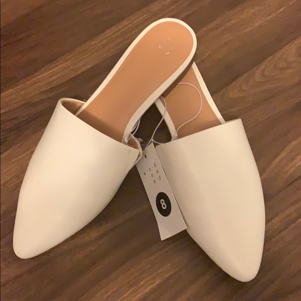 Size 8 white slip ons